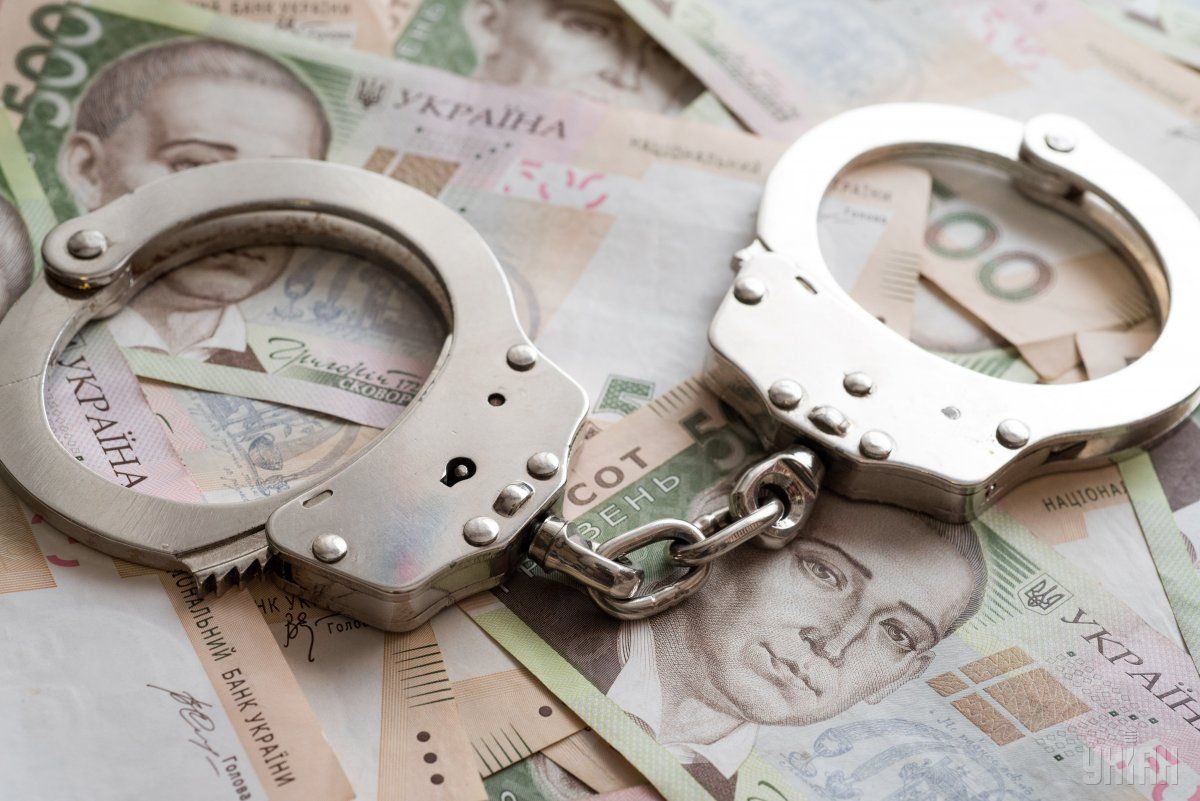  în timpul transferului de bani către un funcționar, anchetatorii poliției au documentat acțiunile ilegale ale unui bărbat de 42 de ani/Foto UNIAN